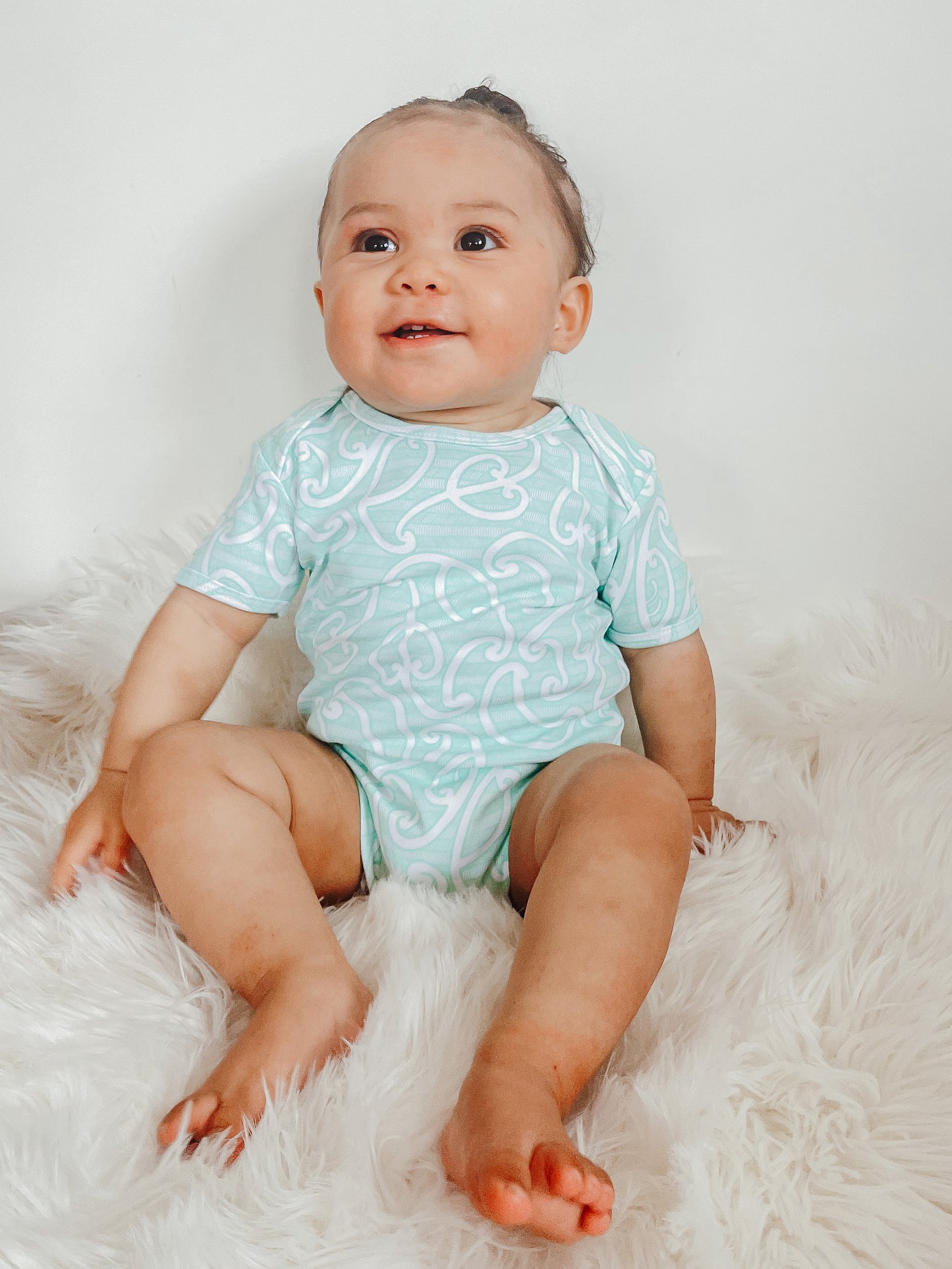 Raumati (Kārikiōrangi/Teal) T-Shirt Onesie